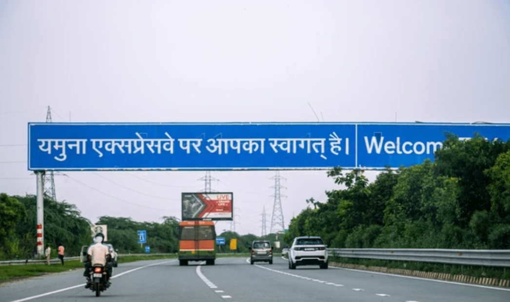 Real estate buyers discussing common mistakes to avoid in Yamuna Expressway property investments